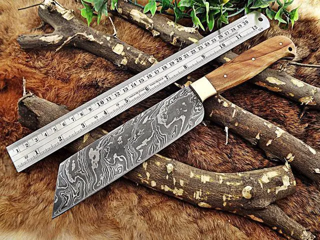 Main image of 12 Inches long custom made Damascus steel full tang butcher Knife 7" full tang blade blade Natural Kow wood scale with brass bolster