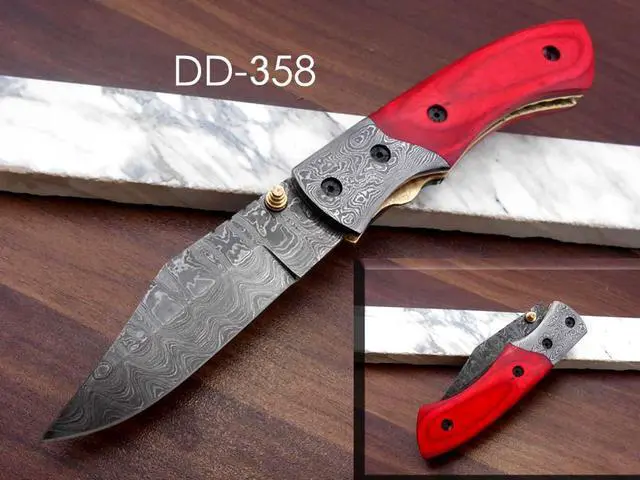 Main image of 8.3" long hand forged custom made Damascus steel pocket clip folding knife, Red colored Camel bone scale, cow leather sheath Red