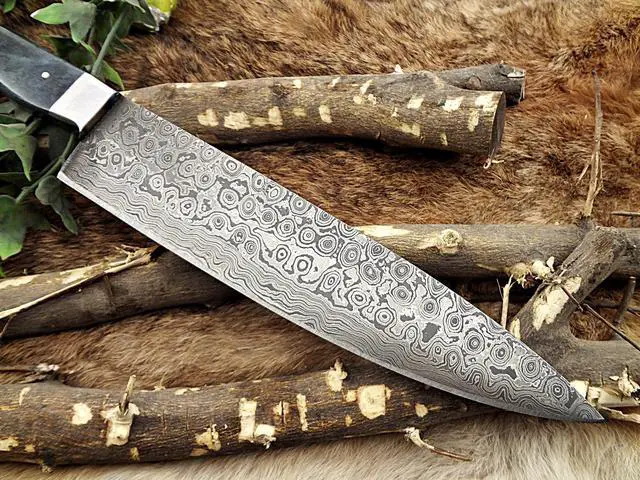 Alt view image 3 of 6 - Rain drop pattern Damascus Steel chef Knife 13.5 Inches long, 7.5" Rain drop pattern hand forged Damascus steel blade, Blue Colored camel bone with brass bolster scale
