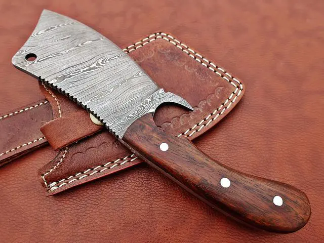 Alt view image 3 of 7 - 9" long hand forged Twist Pattern Damascus steel Butcher Meat cleaver, Natural walnut wood scale, Cow hide Leather sheath included Brown