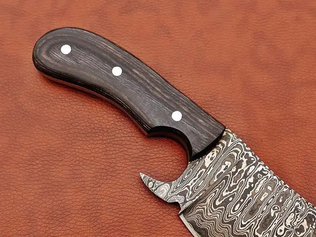 Alt view image 6 of 7 - 10" long hand forged rain drop Pattern Damascus steel Butcher Meat cleaver, Natural walnut wood scale, Cow hide Leather sheath included (Black)