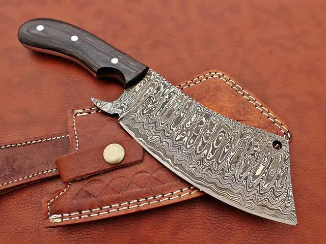 Alt view image 3 of 7 - 10" long hand forged rain drop Pattern Damascus steel Butcher Meat cleaver, Natural walnut wood scale, Cow hide Leather sheath included (Black)