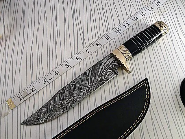 Main image of 13.5 Inches long Damascus steel custom made bowie Knife bull horn with engraved brass scale Hand Forged 8" blade cow hide leather sheath