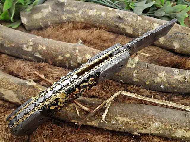 Alt view image 4 of 6 - Damascus Steel Tanto blade folding knife Camouflage colored Razen scale, Cow Leather sheath