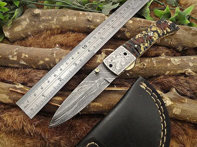 Alt view image 7 of 7 - Damascus Steel Folding knife, Exotic Jigged scale in Camouflage color, Thumb knob & liner lock, Cow Leather sheath (Camouflage)