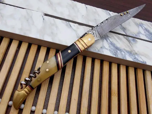 Alt view image 4 of 7 - 8 Inches long Damascus steel Hand Forged Lagouile Folding Knife W/wine opener, Corkscrew, Bull horn camel bone & brass scale, Cow leather sheath with Belt loop