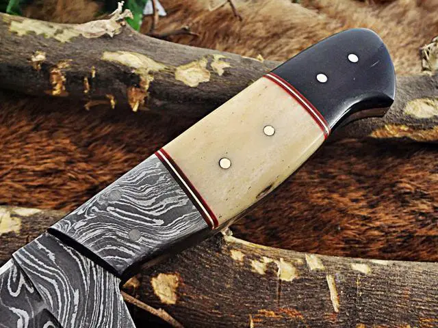 Alt view image 2 of 6 - 9 " Long hand forged Damascus steel full tang skinning Knife, Natural camel Bone and Buffalo Horn scale with Bolster Cow hide Leather sheath