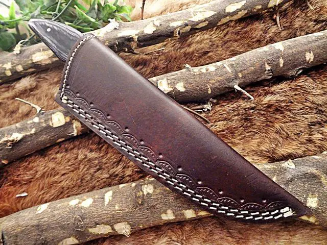Alt view image 4 of 7 - 9" Long Damascus steel skinning knife, 4.5" hand forged full tang blade with 4" cutting, 2 tone Dollar wood Scale, cow hide Leather sheath