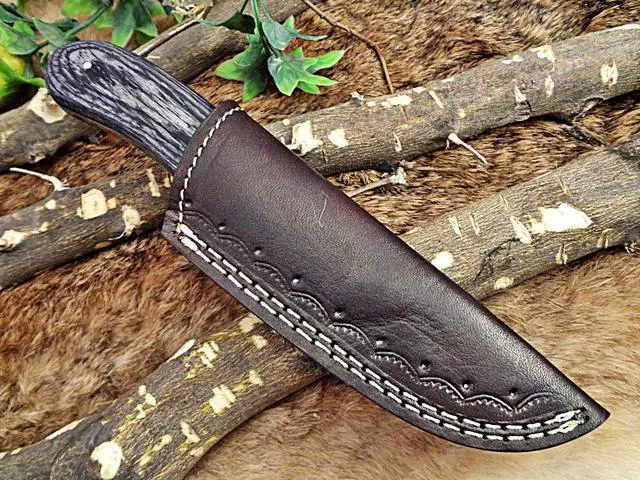 Alt view image 6 of 6 - 8" Long skinning knife, 4" full tang gut hook blade, hand forged Damascus steel, 2 tone Dollar wood scale, Cow Leather sheath