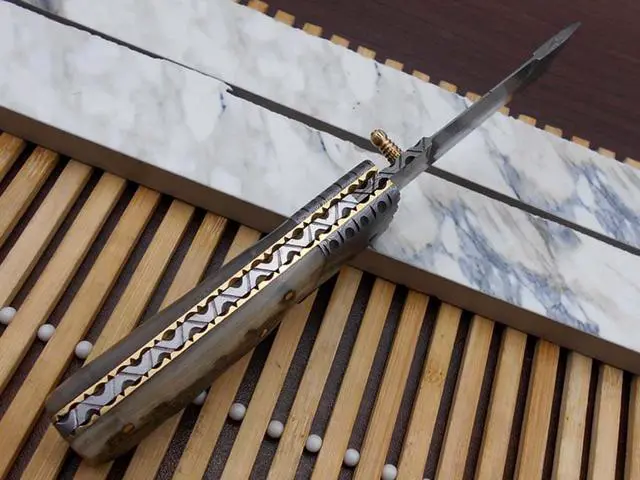 Alt view image 3 of 6 - Damascus steel 7.5" long Folding Knife Ram horn with Damascus bolster scale, custom made 3" Hand Forged blade cow hide leather sheath