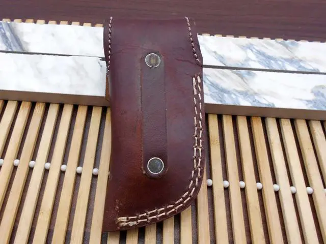 Alt view image 4 of 6 - Damascus steel 7.5" long Folding Knife Ram horn with Damascus bolster scale, custom made 3" Hand Forged blade cow hide leather sheath