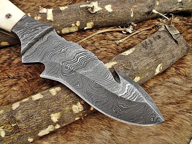 Alt view image 6 of 6 - 9" Long hand forged Damascus steel full tang skinning Knife with gut hook, Camel bone with Damascus Bolster, Cow hide Leather sheath
