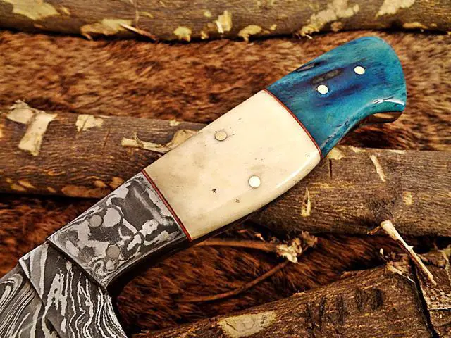 Alt view image 2 of 7 - 9.5" Long hand forged Damascus steel full tang blade skinning Knife, Natural & Blue bone with Damascus bolster scale, Cow Leather sheath
