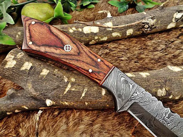 Alt view image 4 of 7 - 11" Long hand forged Damascus steel full tang clip point blade skinning Knife, Natural Rose wood with Brass bolster, Cow Leather sheath