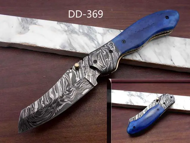 Main image of Hand forged Damascus steel 7.8" folding custom Ledder patren knife 3.5" Blade Colored Bone & Damascus bolster scale cow leather sheath