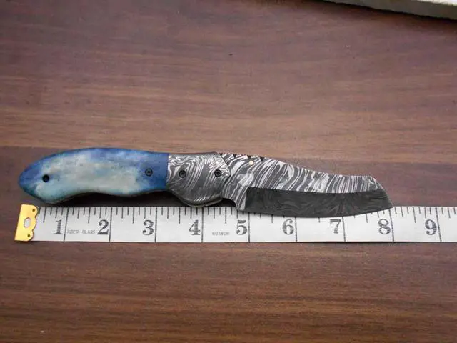 Alt view image 4 of 7 - Hand forged Damascus steel 7.8" folding custom Ledder patren knife 3.5" Blade Colored Bone & Damascus bolster scale cow leather sheath