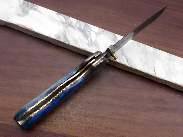 Alt view image 5 of 7 - Hand forged Damascus steel 7.8" folding custom Ledder patren knife 3.5" Blade Colored Bone & Damascus bolster scale cow leather sheath