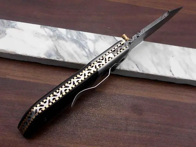 Alt view image 4 of 7 - 7.5" long Damascus steel Folding Knife with pocket clip, Available in Red Blue, Black & white colors scales with Damascus bolster, custom made 3" Hand Forged blade,  cow hide leather sheath