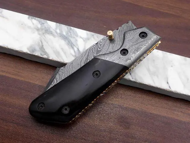 Alt view image 7 of 7 - 7.5" long Damascus steel Folding Knife with pocket clip, Available in Red Blue, Black & white colors scales with Damascus bolster, custom made 3" Hand Forged blade,  cow hide leather sheath
