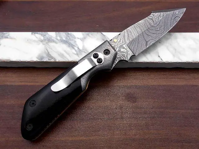 Alt view image 5 of 7 - 7.5" long Damascus steel Folding Knife with pocket clip, Available in Red Blue, Black & white colors scales with Damascus bolster, custom made 3" Hand Forged blade,  cow hide leather sheath