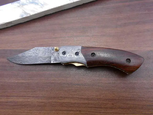 Alt view image 2 of 7 - 8.3" long hand forged custom made Damascus steel pocket clip folding knife, Walnut wood scale with Damascus Bolster, cow leather sheath