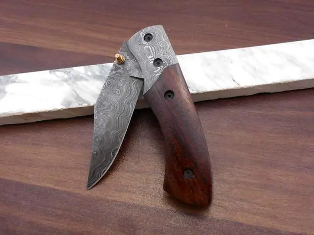 Alt view image 3 of 7 - 8.3" long hand forged custom made Damascus steel pocket clip folding knife, Walnut wood scale with Damascus Bolster, cow leather sheath