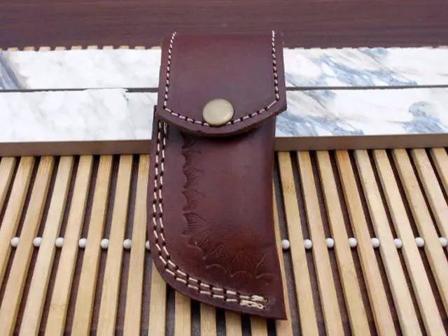 Alt view image 2 of 7 - Damascus steel Tanto blade Folding Knife, equipped with Thumb knob & liner lock, Available in various natural scales with Damascus bolster, Cow hide leather sheath