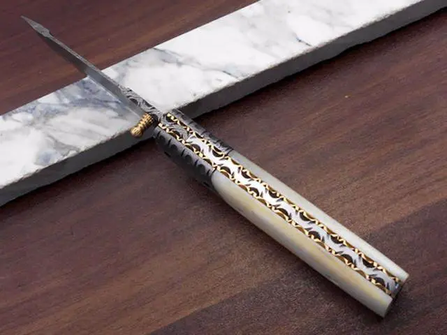 Alt view image 3 of 7 - Damascus steel Tanto blade Folding Knife, equipped with Thumb knob & liner lock, Available in various natural scales with Damascus bolster, Cow hide leather sheath