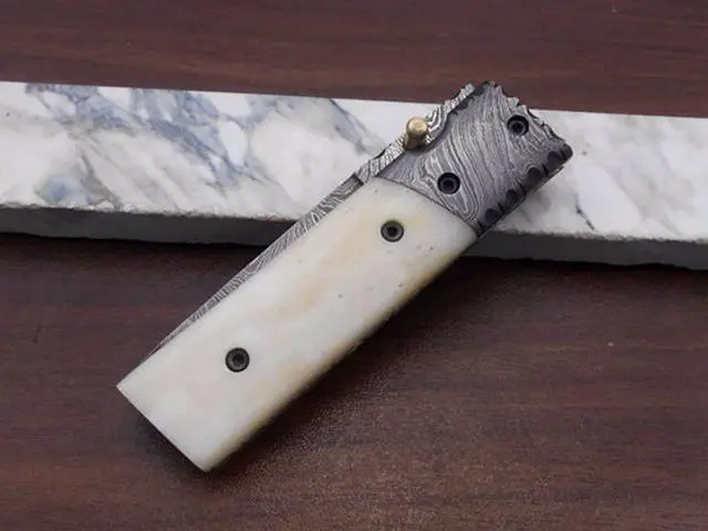 Alt view image 4 of 7 - Damascus steel Tanto blade Folding Knife, equipped with Thumb knob & liner lock, Available in various natural scales with Damascus bolster, Cow hide leather sheath