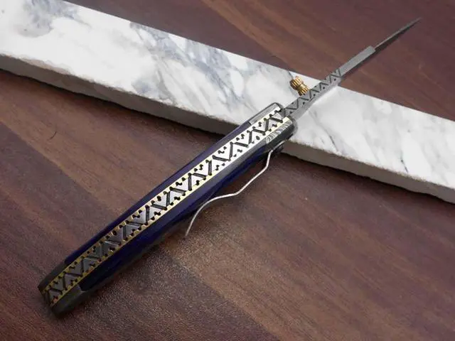 Alt view image 4 of 7 - 8" long Folding Knife with pocket clip, Hand forged Damascus steel 3.5" blade. Available in Walnut wood, Bull horn, Ram Horn, Red & Blue scale with Damascus Bolster, Cow hide Leather sheath