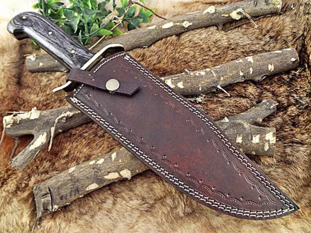 Alt view image 3 of 5 - 15" long hand forged Damascus steel hunting Bowie knife with brass finger guard, 2 tone over 5" Dollar wood scale, Cow hide Leather sheath