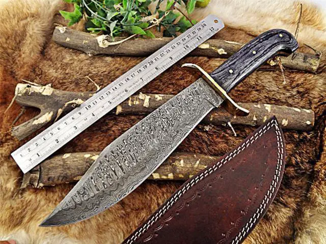 Alt view image 4 of 5 - 15" long hand forged Damascus steel hunting Bowie knife with brass finger guard, 2 tone over 5" Dollar wood scale, Cow hide Leather sheath