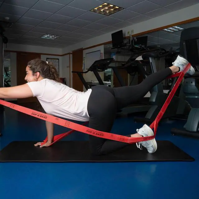 Alt view image 2 of 3 - Mueller SUP-R BAND Multi-Grip Resistance Exerciser: 7-loop / 6 yds. / Medium Resistance (Green) *medium