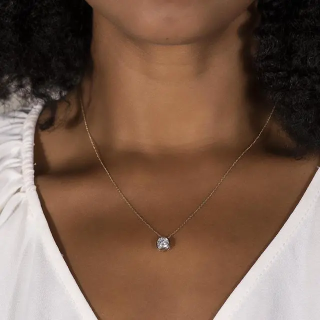 Alt view image 5 of 7 - 14K Yellow Gold Moissanite by Charles & Colvard 6.5mm Round Pendant Necklace 1.00ct DEW