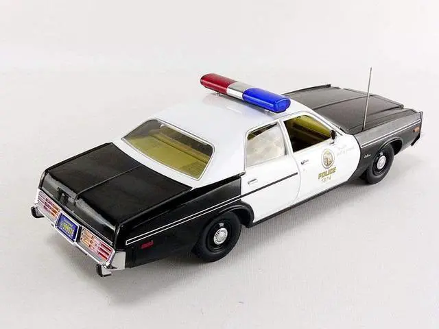 Alt view image 2 of 7 - 1977 Dodge Monaco Metropolitan Police with T-800 Endoskeleton Figure \The Terminator\" (1984) Movie 1/18 Diecast Model Car by Greenlight"