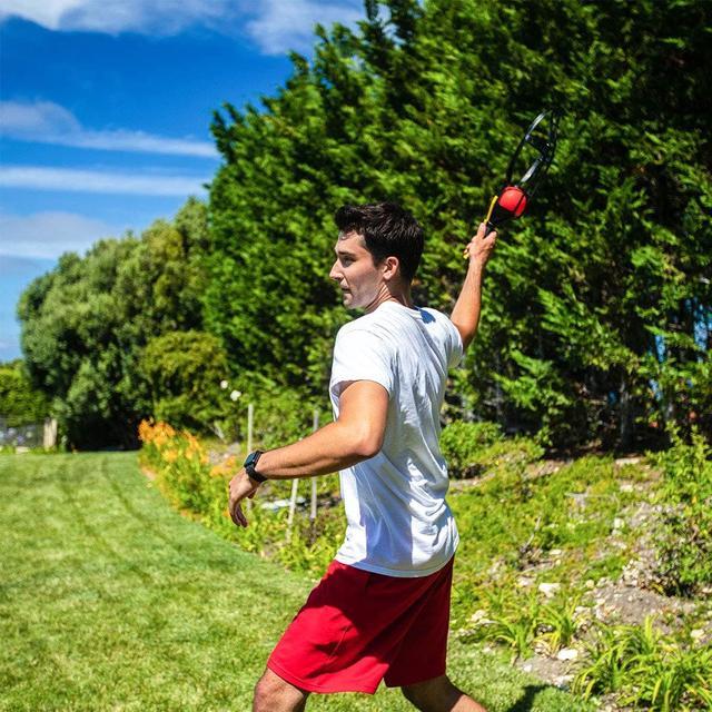Alt view image 17 of 18 - Wham-O Game Time! Trac Ball Classic Outdoor Game with 2 Rackets and 2 Balls