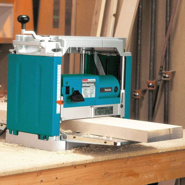 Alt view image 9 of 13 - Makita 2012NB 12 in. 15.0 Amp 8,500 RPM Interna-Lok Portable Planer