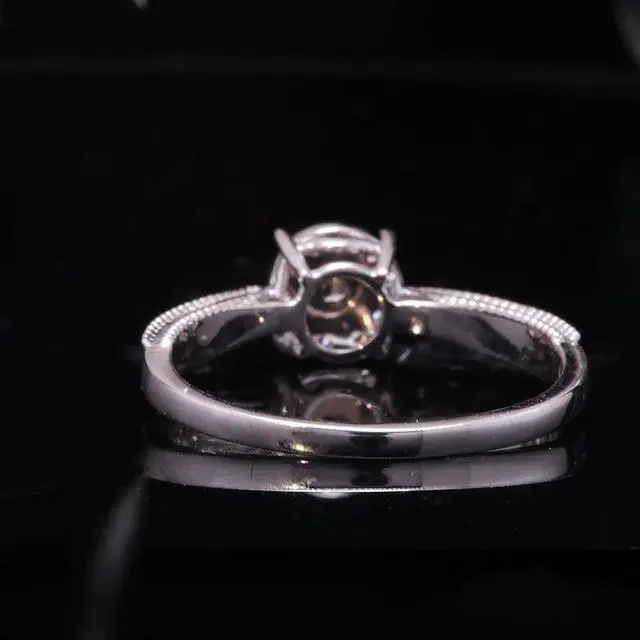 Alt view image 3 of 7 - 18K Gold Halo Ring with 1 Carat Main Diamond and 0.1 Carat Accented Diamonds, D Color, VVS1 Clarity, Round Cut