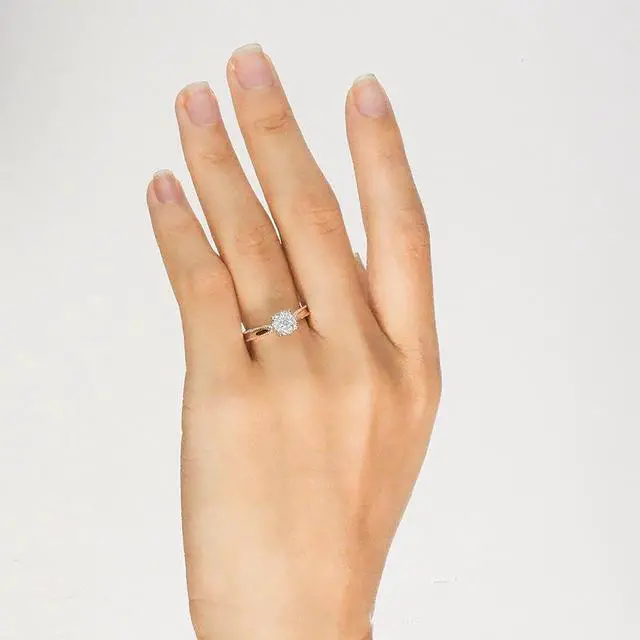 Alt view image 4 of 7 - 18K Gold Halo Ring with 1 Carat Main Diamond and 0.1 Carat Accented Diamonds, D Color, VVS1 Clarity, Round Cut