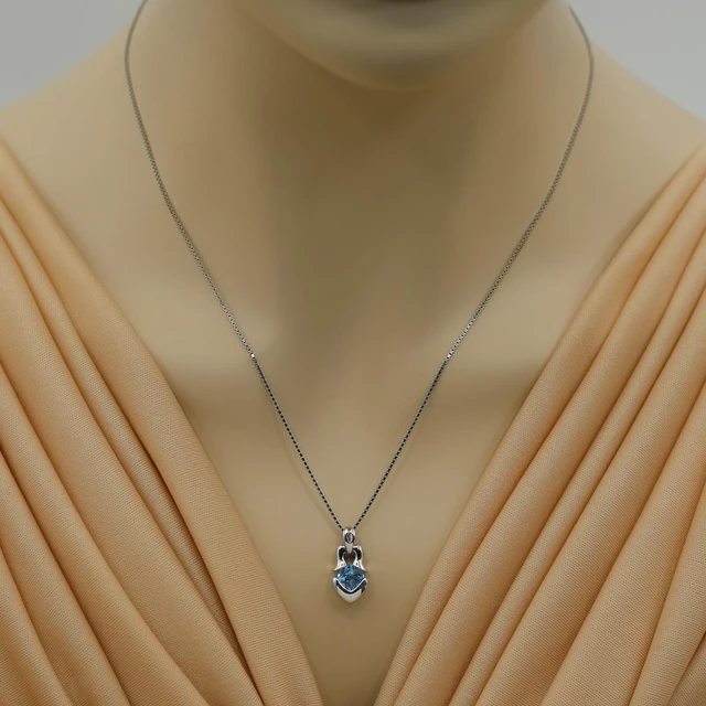 Alt view image 6 of 6 - Swiss Blue Topaz Sterling Silver Tumi Pendant Necklace