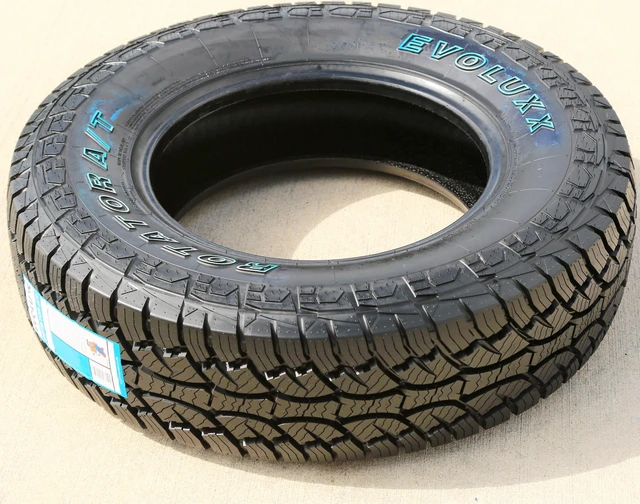 Alt view image 2 of 7 - 235/85R16 120/116S E (10 Ply) - Evoluxx Rotator A/T All-Terrain Tire