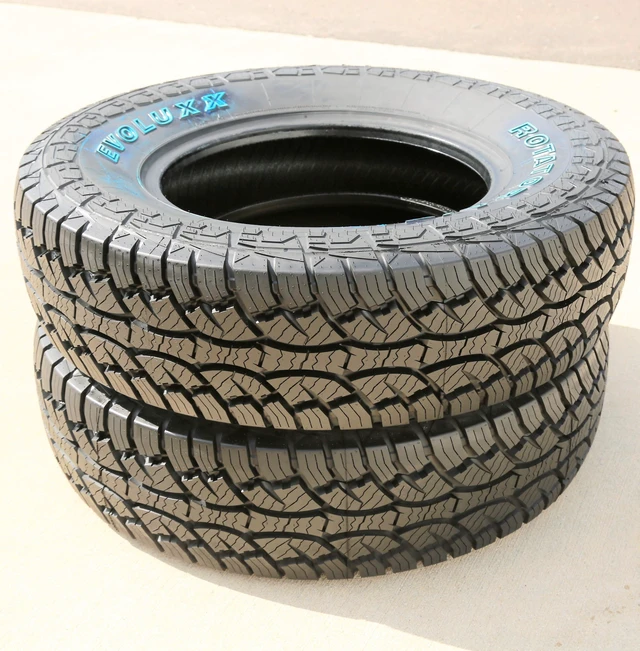Alt view image 3 of 7 - 235/85R16 120/116S E (10 Ply) - Evoluxx Rotator A/T All-Terrain Tire