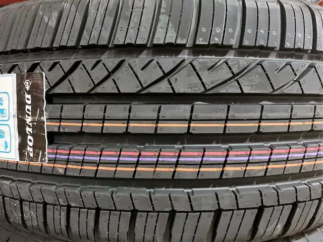 Alt view image 9 of 12 - (1) New Dunlop Grandtrek Touring AS 255/50R19 107H 200 AA Tire