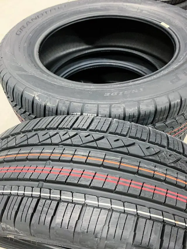 Alt view image 11 of 12 - (1) New Dunlop Grandtrek Touring AS 255/50R19 107H 200 AA Tire