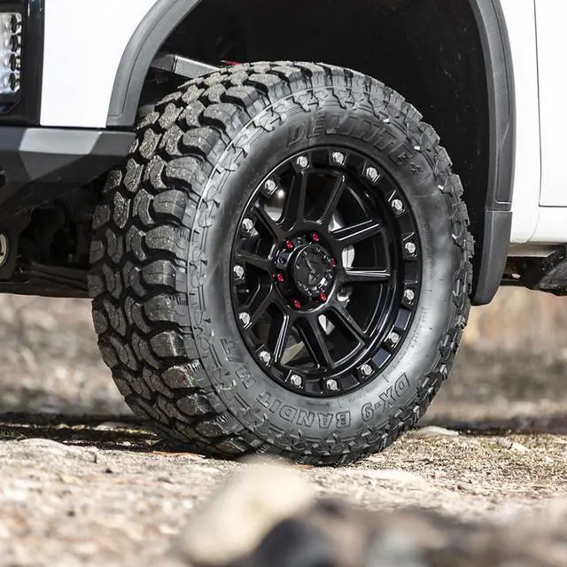 Alt view image 5 of 7 - 33X12.50R20 114Q E (10 Ply) - Delinte DX-9 Bandit M/T Mud Tire