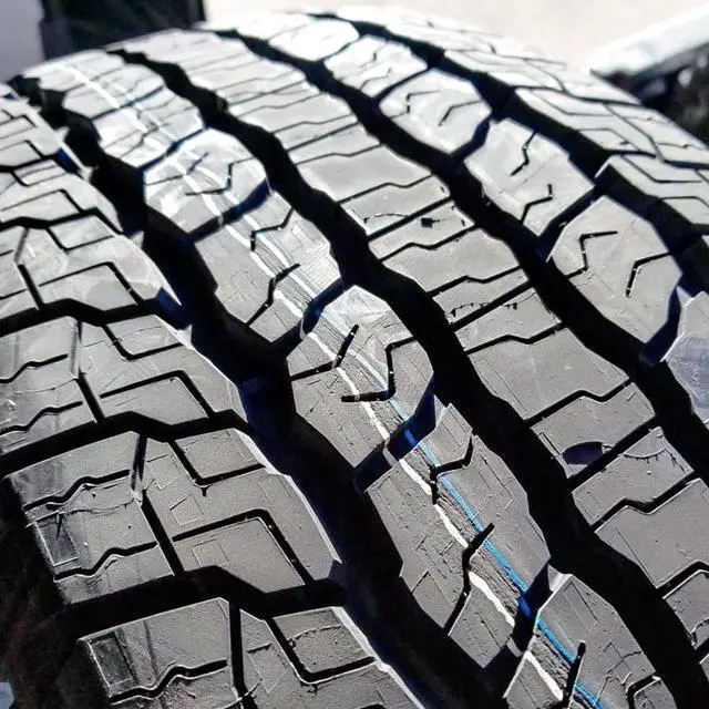 Alt view image 2 of 3 - 275/60R20 115S - Goodyear Wrangler Territory A/T All-Terrain Tire