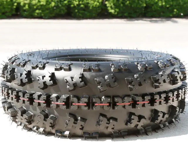 Alt view image 2 of 7 - 21x7.00-10 30F 6 Ply - Forerunner Eos Front All-Terrain Tire