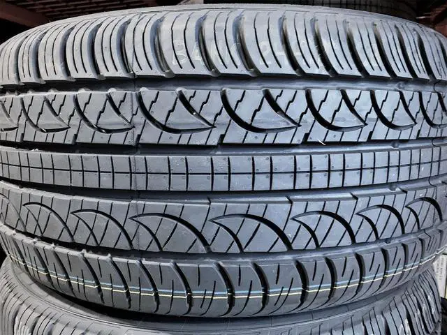 Alt view image 5 of 7 - Pirelli P-Zero Nero All-Season P235/50R18 97W bsw All-Season Tire