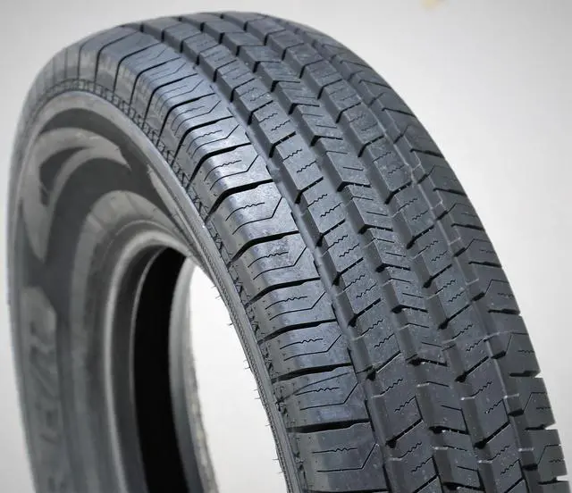 Alt view image 2 of 7 - 235/65R16 121/119R E (10 Ply) - Evoluxx Rotator H/T Highway All Season Tire