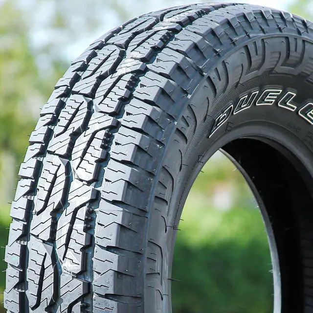 Alt view image 2 of 7 - Bridgestone Dueler A/T REVO 3 All-Terrain Tire - LT265/70R18 124/121R E (10 Ply)